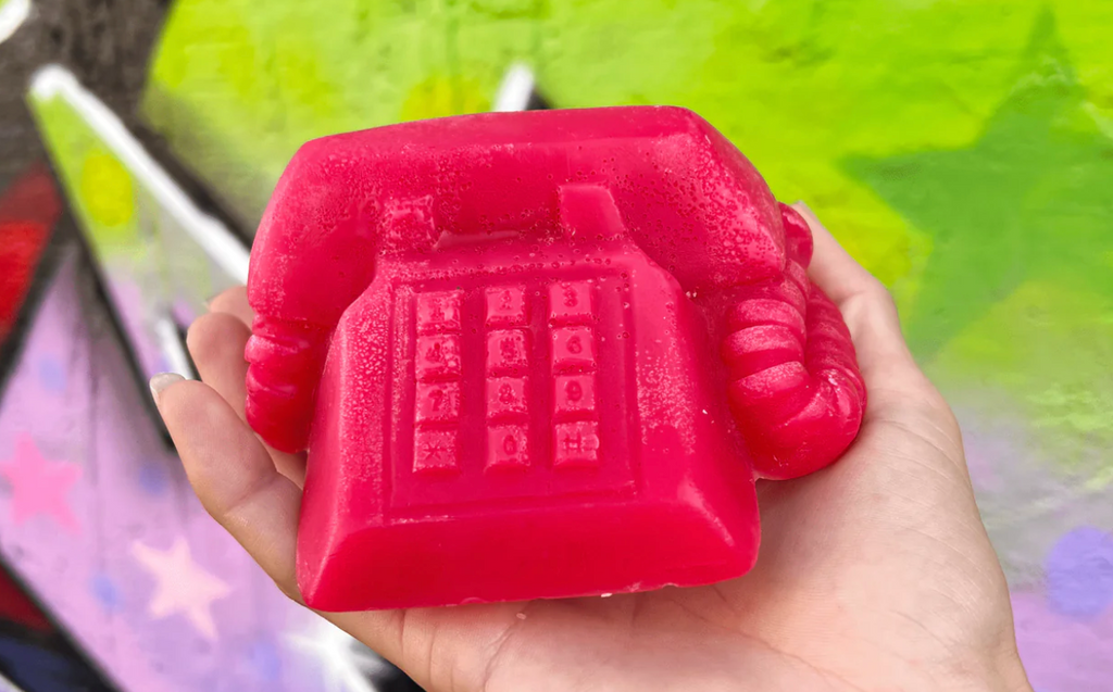 red telephone shaped wax