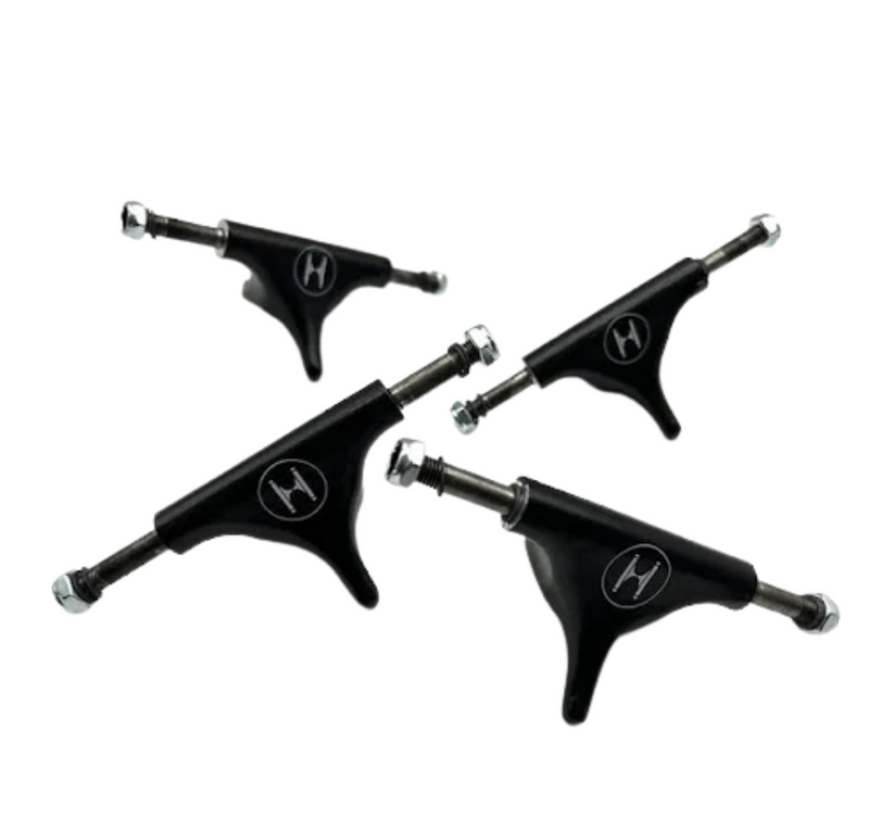 4 black huck trucks