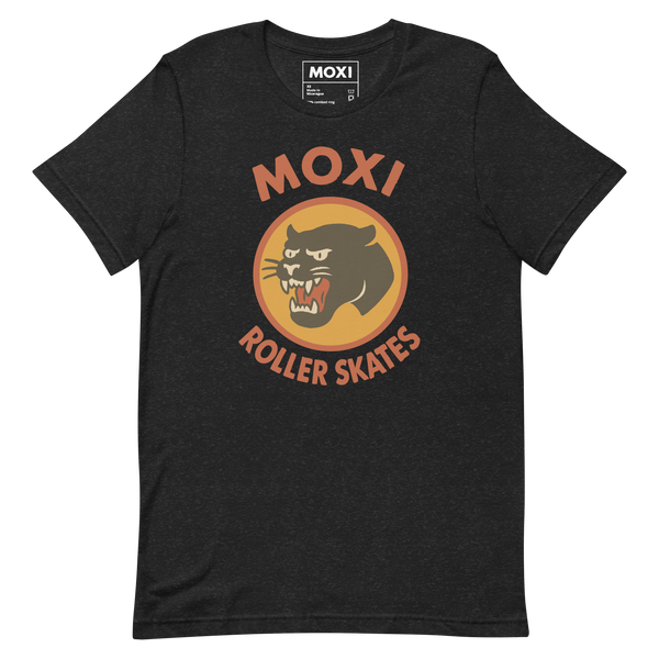Moxi unisex T-shirt featuring a bold black panther graphic in an orange circle with red “MOXI Roller Skates” text in vintage-style lettering. Soft cotton fabric with a classic fit, perfect for casual wear or skate sessions.