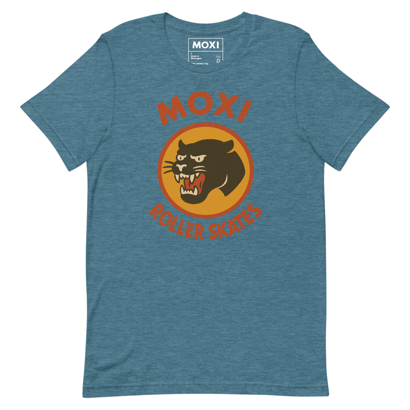Moxi unisex T-shirt featuring a bold black panther graphic in an orange circle with red “MOXI Roller Skates” text in vintage-style lettering. Soft cotton fabric with a classic fit, perfect for casual wear or skate sessions.