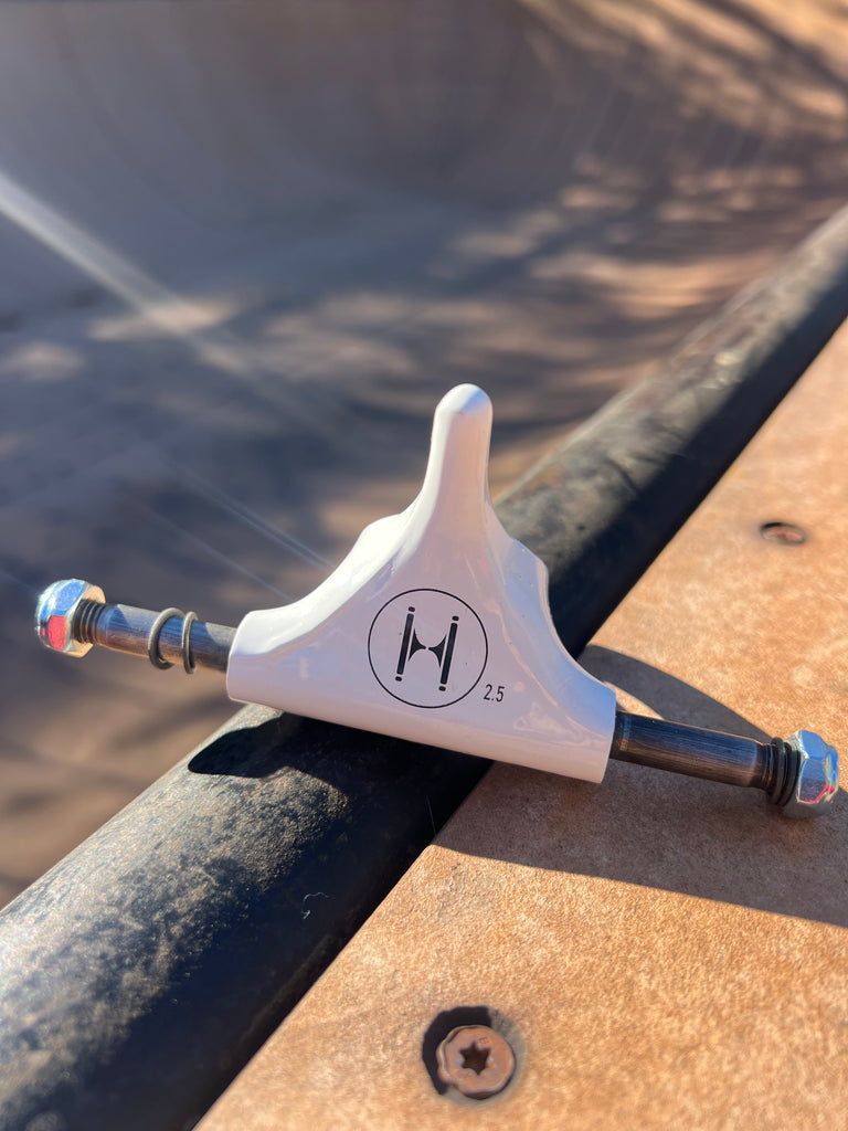 single white huck truck on coping