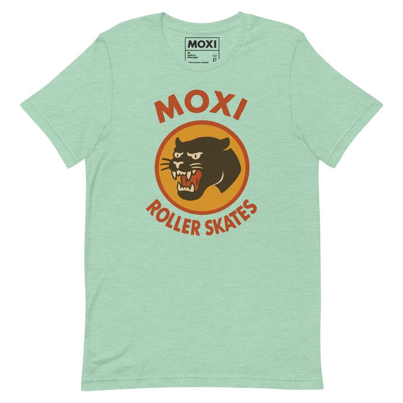 Moxi unisex T-shirt featuring a bold black panther graphic in an orange circle with red “MOXI Roller Skates” text in vintage-style lettering. Soft cotton fabric with a classic fit, perfect for casual wear or skate sessions.