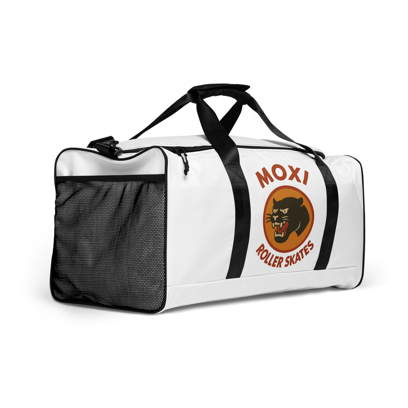White Moxi duffel bag with black straps and shoulder pad, featuring a bold panther logo in an orange circle and red “MOXI Roller Skates” text printed on the front panel.