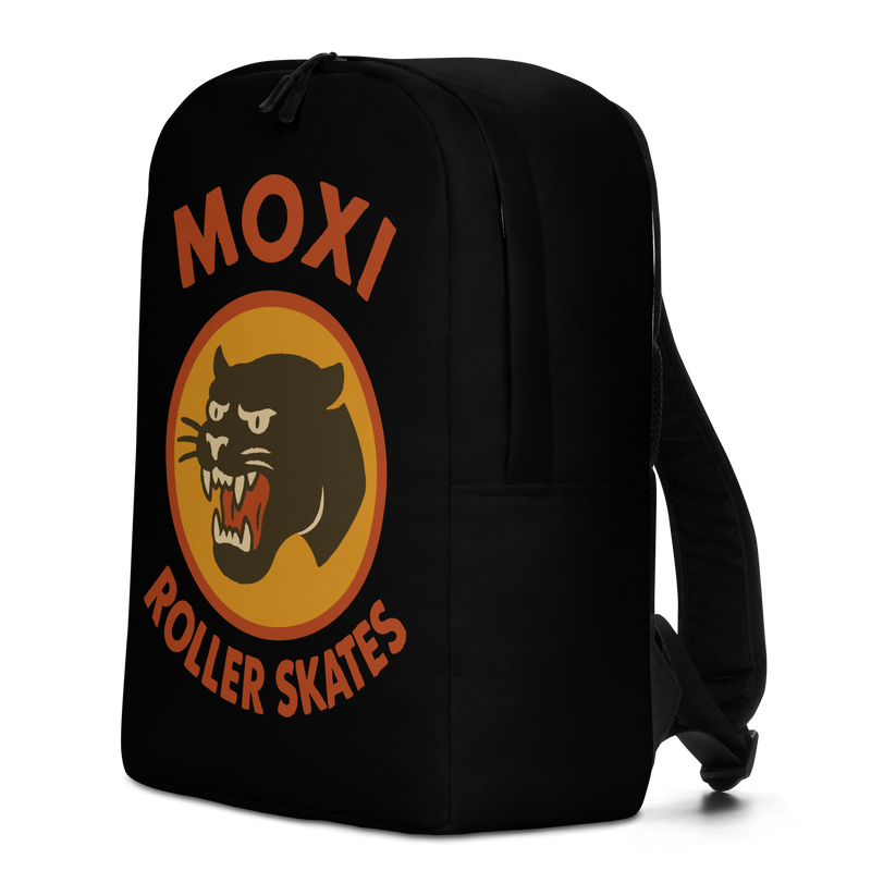 Black Moxi backpack with a large front graphic featuring a fierce black panther inside an orange circle and bold red “MOXI Roller Skates” text. Designed with padded shoulder straps and side pocket for everyday use or skate gear.