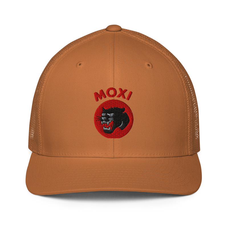Burnt orange Moxi trucker hat with mesh sides and embroidered front patch featuring a fierce black panther inside a red circle, with red “MOXI” text above the graphic.