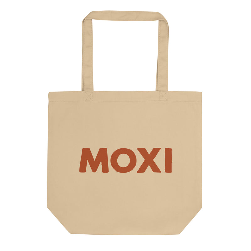 Beige Moxi canvas tote bag featuring a bold retro-style panther graphic in an orange circle with Japanese katakana text above and below translating to “Moxi Roller Skates.” Durable cotton material with sturdy shoulder straps, ideal for everyday use.
