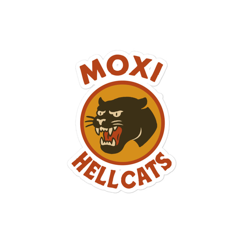 Die-cut Moxi Hellcats sticker featuring a snarling black panther graphic in an orange circle with bold red “MOXI” text above and “HELLCATS” below, outlined in white for a peel-and-stick finish.
