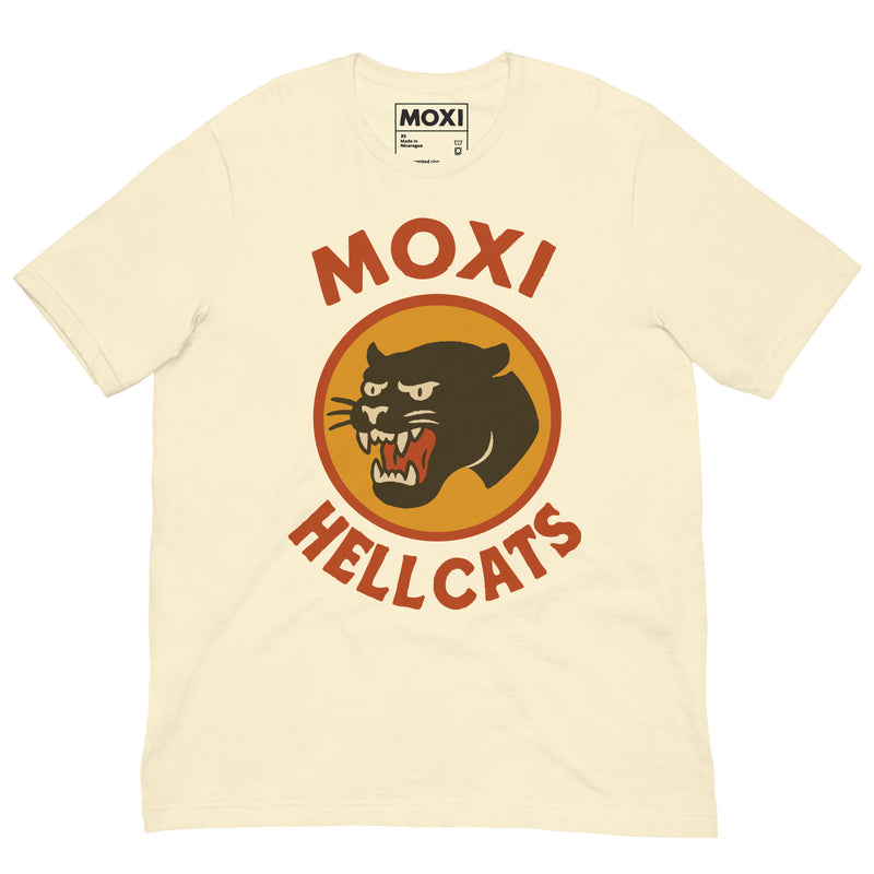 Cream Moxi Hellcats unisex T-shirt with a vintage-style black panther graphic in an orange circle on the front, featuring bold red “MOXI” text above and “HELLCATS” below. Made from soft, breathable cotton-blend fabric for everyday comfort.