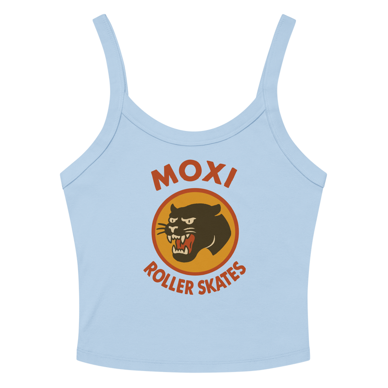 Light blue Moxi crop top with spaghetti straps, featuring a vintage-style black panther logo in an orange circle and bold red “MOXI Roller Skates” text on the front.